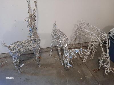 Three Christmas deer yard decor