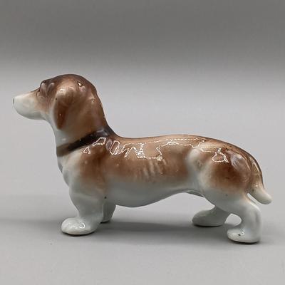 LOT 4: Hagen Renaker Dachshund Pup Lenk H1569, WhittleWare Wooden Dachshund, Occupied Japan Porcelain Dogs & More