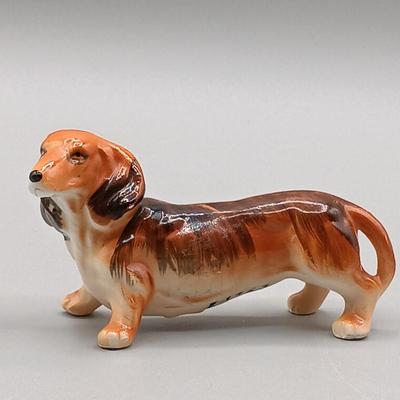 LOT 4: Hagen Renaker Dachshund Pup Lenk H1569, WhittleWare Wooden Dachshund, Occupied Japan Porcelain Dogs & More
