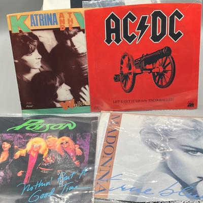 LOT 135B: Stack of 45s Vinyl (Dozens of Records) - Bruce Springsteen, AC/DC, Bob Dylan and Much More