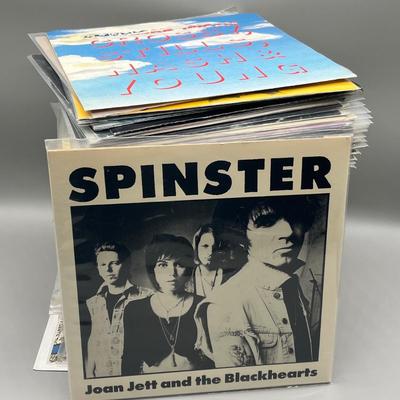 LOT 136B: Stack of 45s Vinyl (Dozens of Records) - Elvis, David Bowie, Joan Jett and Much More