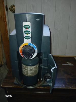 Coleman Hot Water On Demand Portable Water Heater with portable tote-along ten-gallon water tank