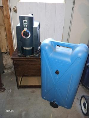 Coleman Hot Water On Demand Portable Water Heater with portable tote-along ten-gallon water tank