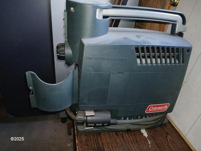 Coleman Hot Water On Demand Portable Water Heater with portable tote-along ten-gallon water tank