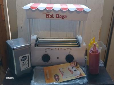 Nostalgia Electrics Old Fashioned Hot dog roller grill with condiment containers, chrome napkin holder
