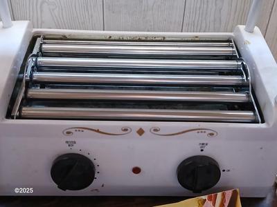 Nostalgia Electrics Old Fashioned Hot dog roller grill with condiment containers, chrome napkin holder