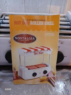 Nostalgia Electrics Old Fashioned Hot dog roller grill with condiment containers, chrome napkin holder