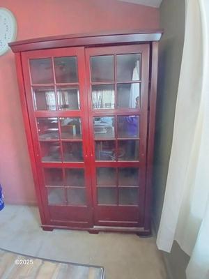 Red sliding glass door display cabinet with adjustable Shelves and drawer storage