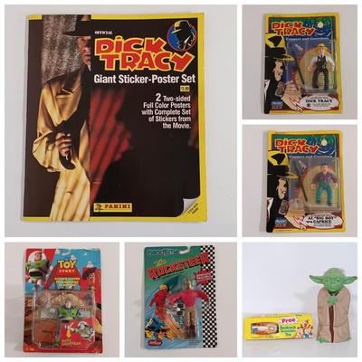LOT 160B: Dick Tracy Sticker-Poster Set and Playmates Figures w/ 1981 Yoda Puppet, Pebbles Cereal Flintstones Toy & More
