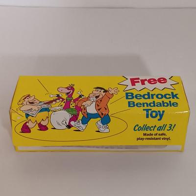 LOT 160B: Dick Tracy Sticker-Poster Set and Playmates Figures w/ 1981 Yoda Puppet, Pebbles Cereal Flintstones Toy & More