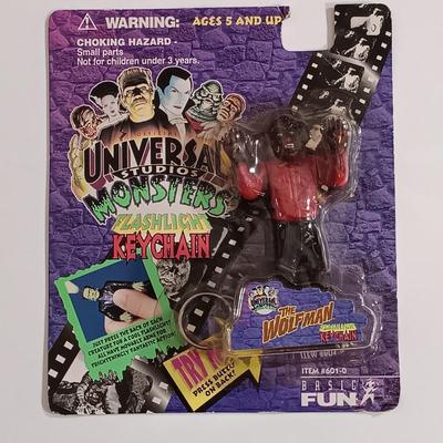 LOT 165B: Numbered Photos from Creature from the Black Lagoon and Frankenstein Meets the Wolf Man w/ Wolfman Keychain & American...