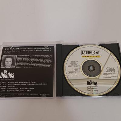 LOT 176B: The Beatles Anthology DVD Set, A Long and Winding Road DVD Set, The Beatles Inside Interviews CD Set & In Their Own Words...