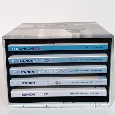 LOT 177B: John Lennon 1998 CD Box Set, Burrows' John Lennon: A Story in Photographs, Henke's Lennon Legend & More
