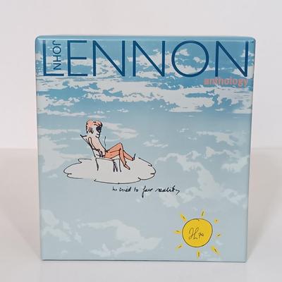 LOT 177B: John Lennon 1998 CD Box Set, Burrows' John Lennon: A Story in Photographs, Henke's Lennon Legend & More