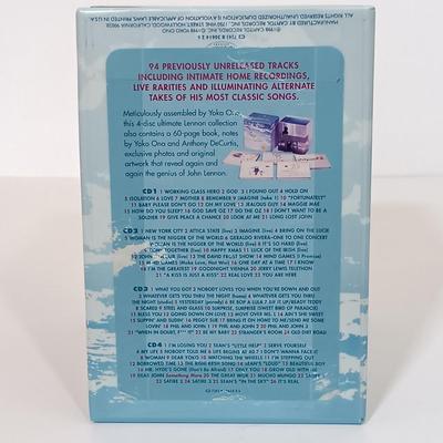 LOT 177B: John Lennon 1998 CD Box Set, Burrows' John Lennon: A Story in Photographs, Henke's Lennon Legend & More