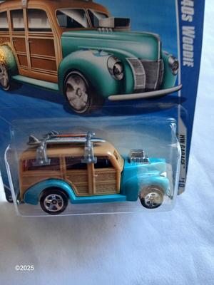 Three new Collectable hot wheels cars