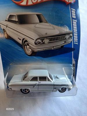 Three new Collectable hot wheels cars