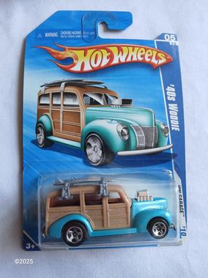 Three new Collectable hot wheels cars