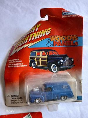 Three Johnny Lightning collectable cars