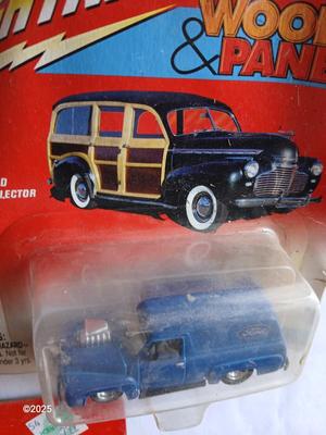 Three Johnny Lightning collectable cars