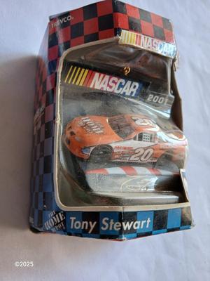 Dale Earnhardt Jr. plaque with Nascar Tony Stewart car, and a mini helmet ornament