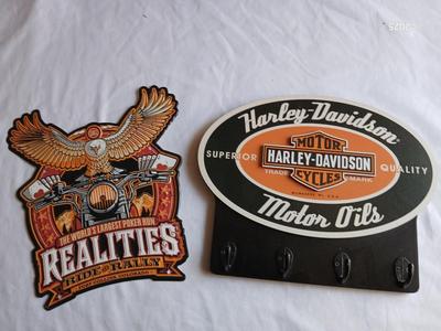 Tin Harley Realities ride and Rally sign Fort Collins, Co. with wooden Harley Davidson motor oils sign with hooks