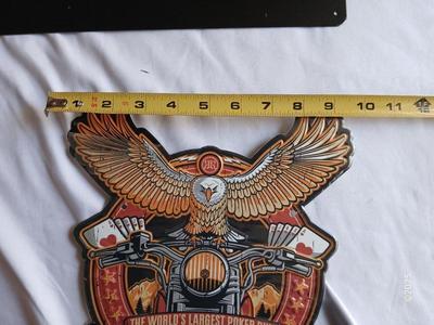 Two tin Harley Davidson collectable Signs Sturgis - and Realities ride and Rally Fort Collins Colorado