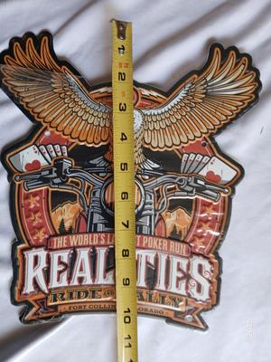 Two tin Harley Davidson collectable Signs Sturgis - and Realities ride and Rally Fort Collins Colorado
