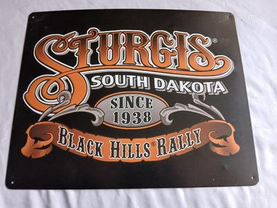 Two tin Harley Davidson collectable Signs Sturgis - and Realities ride and Rally Fort Collins Colorado