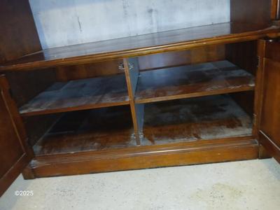 Adjustable wall unit entertainment center