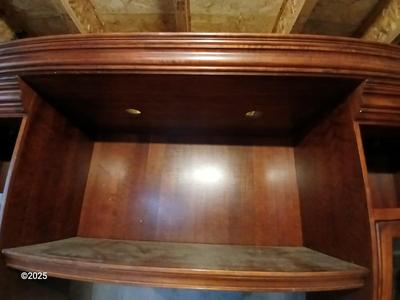 Adjustable wall unit entertainment center