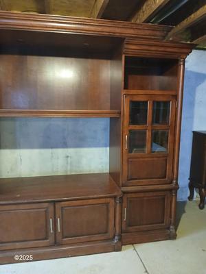 Adjustable wall unit entertainment center