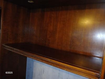 Adjustable wall unit entertainment center