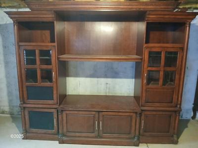 Adjustable wall unit entertainment center