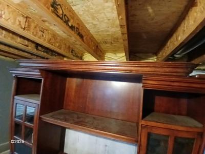 Adjustable wall unit entertainment center