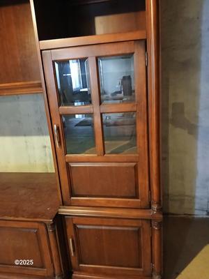 Adjustable wall unit entertainment center