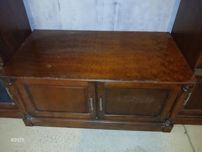 Adjustable wall unit entertainment center