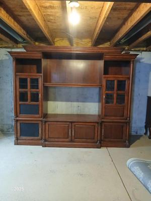 Adjustable wall unit entertainment center