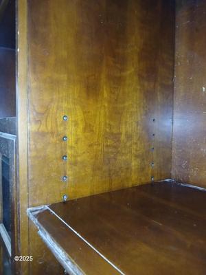 Adjustable wall unit entertainment center