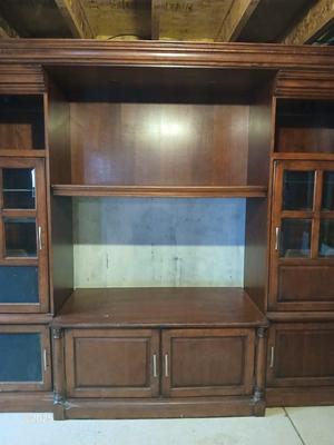 Adjustable wall unit entertainment center