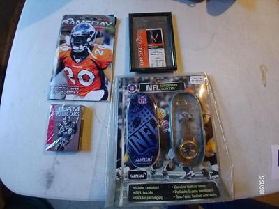 Broncos sports watch - ticket stubs - Gameday magazine - and team playing cards
