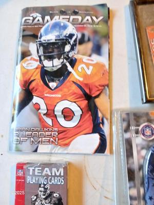 Broncos sports watch - ticket stubs - Gameday magazine - and team playing cards