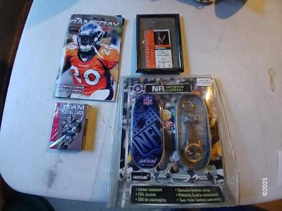 Broncos sports watch - ticket stubs - Gameday magazine - and team playing cards