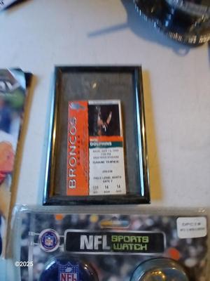 Broncos sports watch - ticket stubs - Gameday magazine - and team playing cards