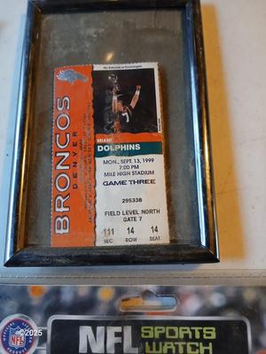 Broncos sports watch - ticket stubs - Gameday magazine - and team playing cards