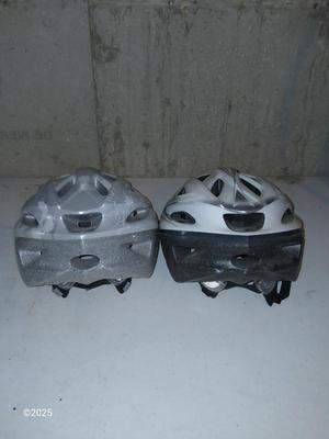 Two adult sized Bicycle helmets