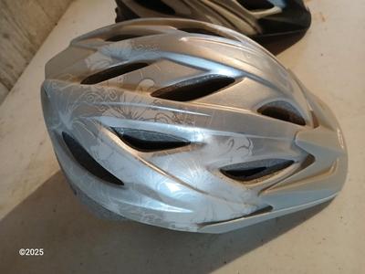 Two adult sized Bicycle helmets