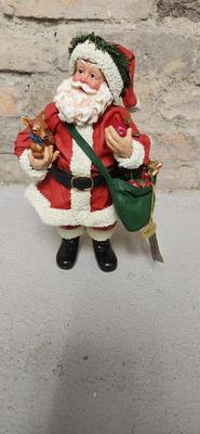 Trio of Clothtique santas