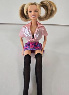 LOT 55B: Variety of Barbies, Ken, 2 Galooob Spice Girls, Britney Spears, and Elvis Dolls