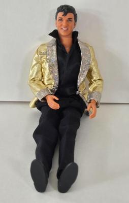 LOT 55B: Variety of Barbies, Ken, 2 Galooob Spice Girls, Britney Spears, and Elvis Dolls